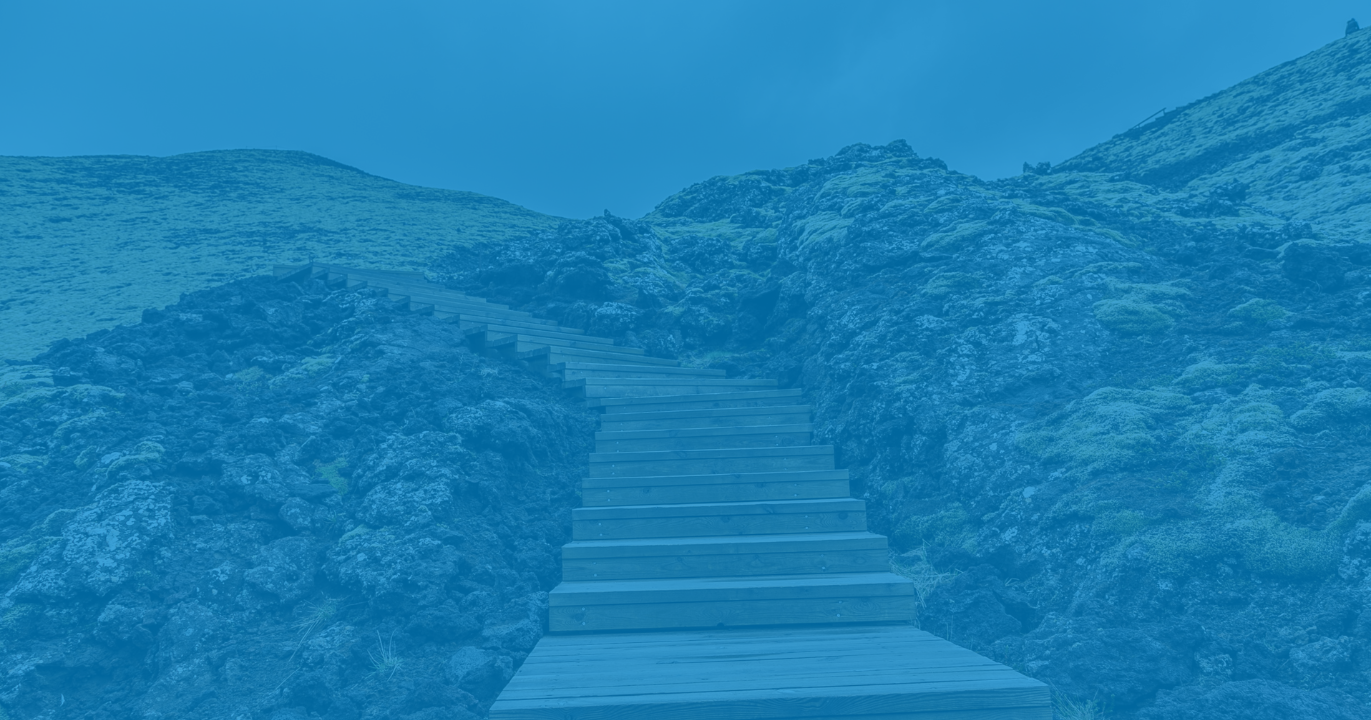 A blue background with steps leading upward, symbolizing progress.