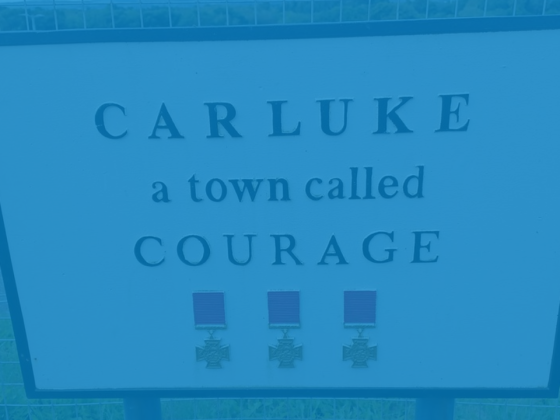 Carluke sign with blue overlay