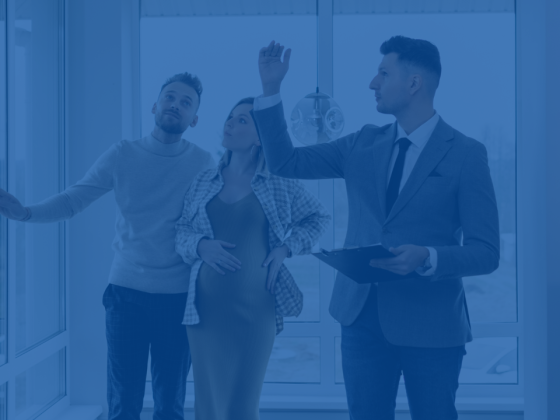 Real estate agent showing a house to potential buyers with a blue overlay.