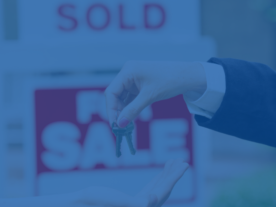 Sold sign with keys being handed over, symbolizing the completion of a home purchase after getting mortgage ready