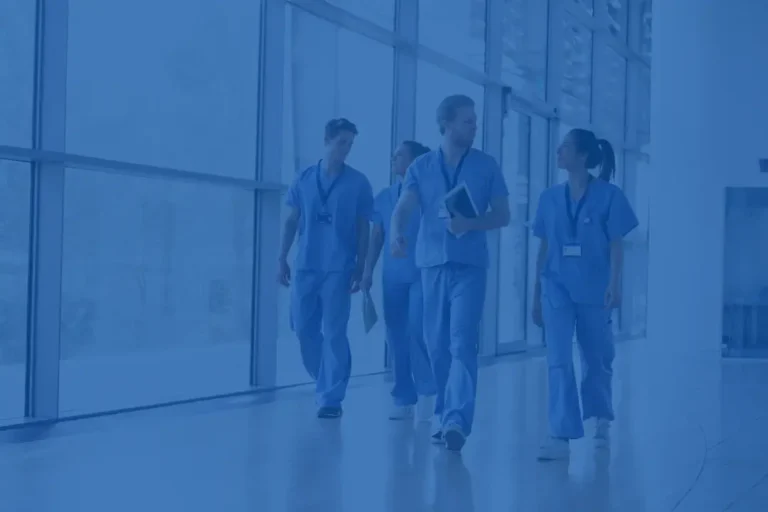 NHS doctors and nurses walking through a hospital corridor, mortgages for NHS workers